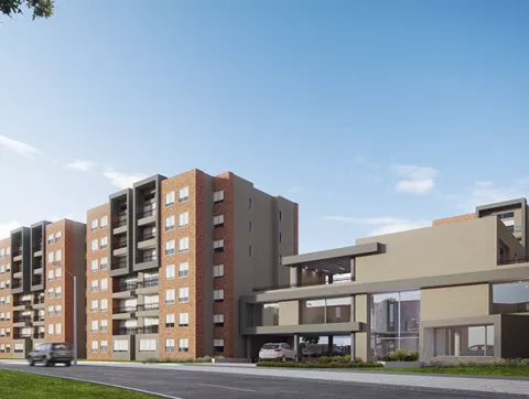 Fachada conjunto Araucaria Colsubsidio muestra edificios, portería, vías de acceso y carros.