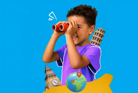 Niño con binoculares en las vacaciones recreativas para empresas de Colsubsidio