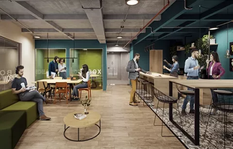 Cafetería del conjunto Arbórea muestra personas sentadas conversando y comiendo onces.
