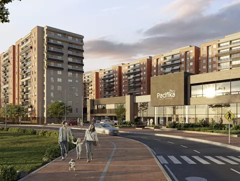 qEntrada del conjunto Pacifika muestra edificios, vía, personas y zonas verdes.