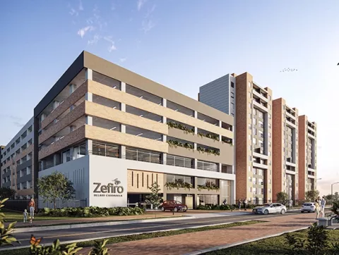 Entrada del conjunto Zéfiro muestra torres, vías de acceso y plantas decorativas. 