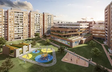 La zona de juegos infantiles del conjunto Arbórea muestra edificios, parques y plantas.