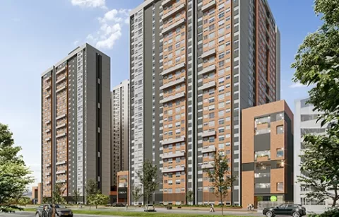 La zona peatonal muestra la entrada del conjunto Eskala, edificios y zonas verdes.