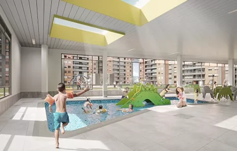 La piscina del conjunto Arbórea muestra niños nadando con flotadores.