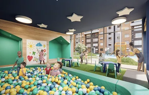 Zona kids de Zefiro muestra a niños juanfo en piscina de pelotas.