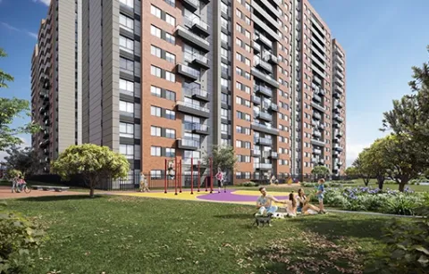 El parque de Centriko muestra edificios, personas y zonas verdes.