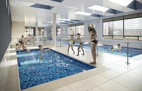 Parque infantil de Centriko muestra niños jugando alrededor de la piscina y otros nadando en ella.