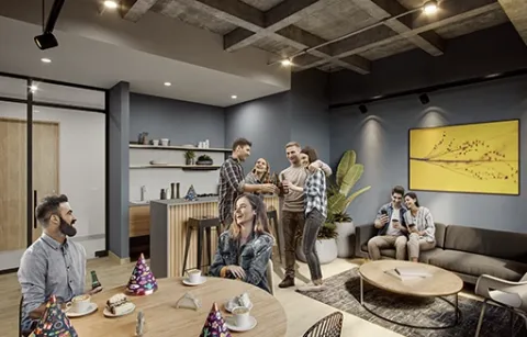 Sala VIP muestra a personas celebrando un cumpleaños.