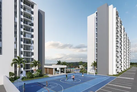Cancha deportiva de Entremontes muestra personas jugando allí y edificios.