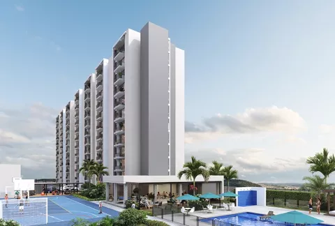 Zona social Entremontes muestra edificio, piscinas y zonas verdes