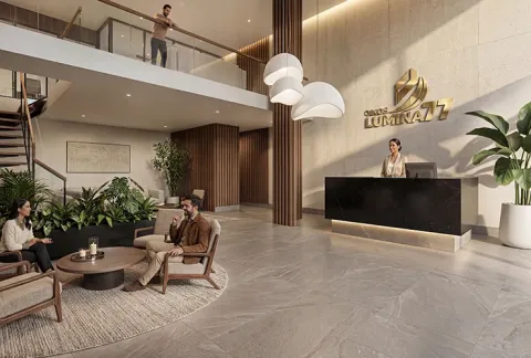 Lobby de Lúmina 77 muestra plantas, sala, recepcionista y decoración
