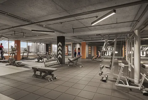 Gimnasio de Terralto muestra personas entrenando en zona de cardio y pesas