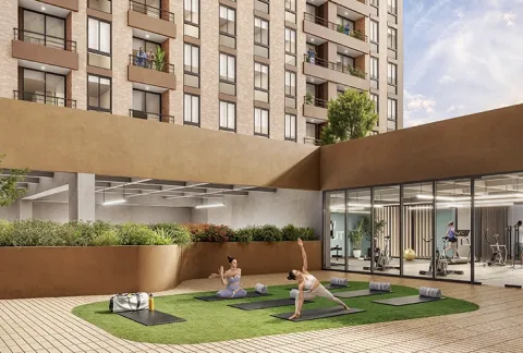 Zona de yoga de Nuva Park muestra mujeres realizando estiramientos